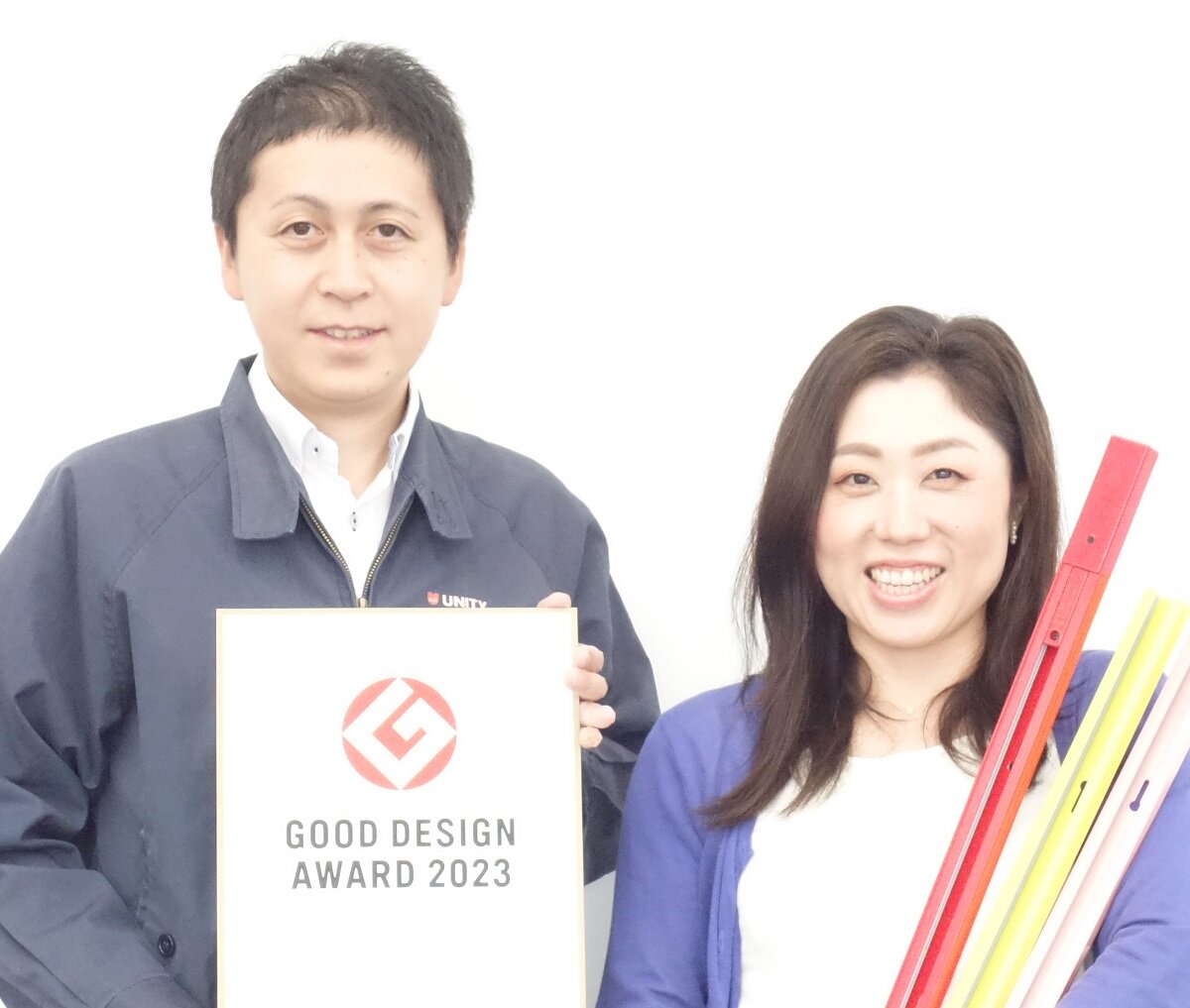 ユニティ　ブランド統括室の松井あかり氏（右）と戸村成仁氏（左）