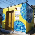 ターナー色彩、豊島区と連携・アーティストが公衆トイレに壁画を