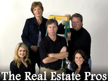 Trademark Propertiesのリチャード・デービス社長（中央）と、社員たち